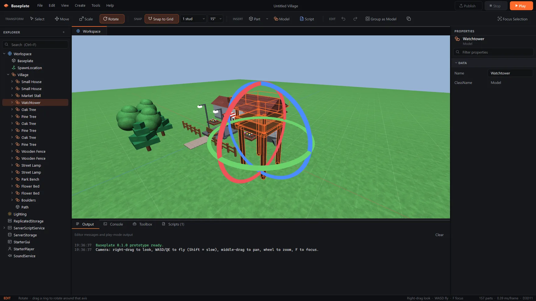 Baseplate with the Watchtower model selected and the Rotate tool's red, green and blue rings around it.